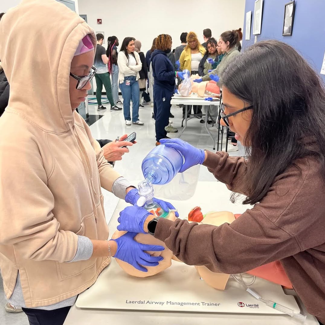 student receiving training on laerdal airway management device