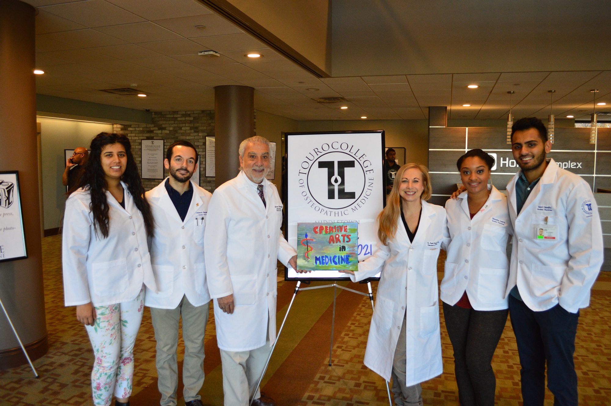 Members of the Creative Arts in Medicine Club of TouroCOM Middletown with their faculty advisor Dr. Jerry Cammarata, COO and Dean of Student Affairs at TouroCOM Middletown.  