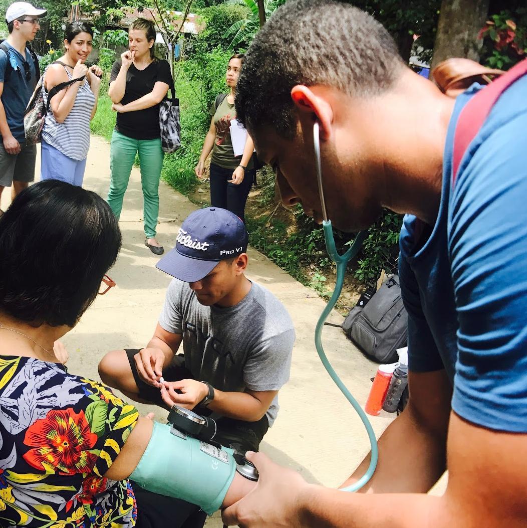 TouroCOM students Stephanie Morales, Brandon Chavez and Hector Zelaya spent part of their summer volunteering with the Federation for International Medical Relief for Children (FIMRC) in the Philippines.