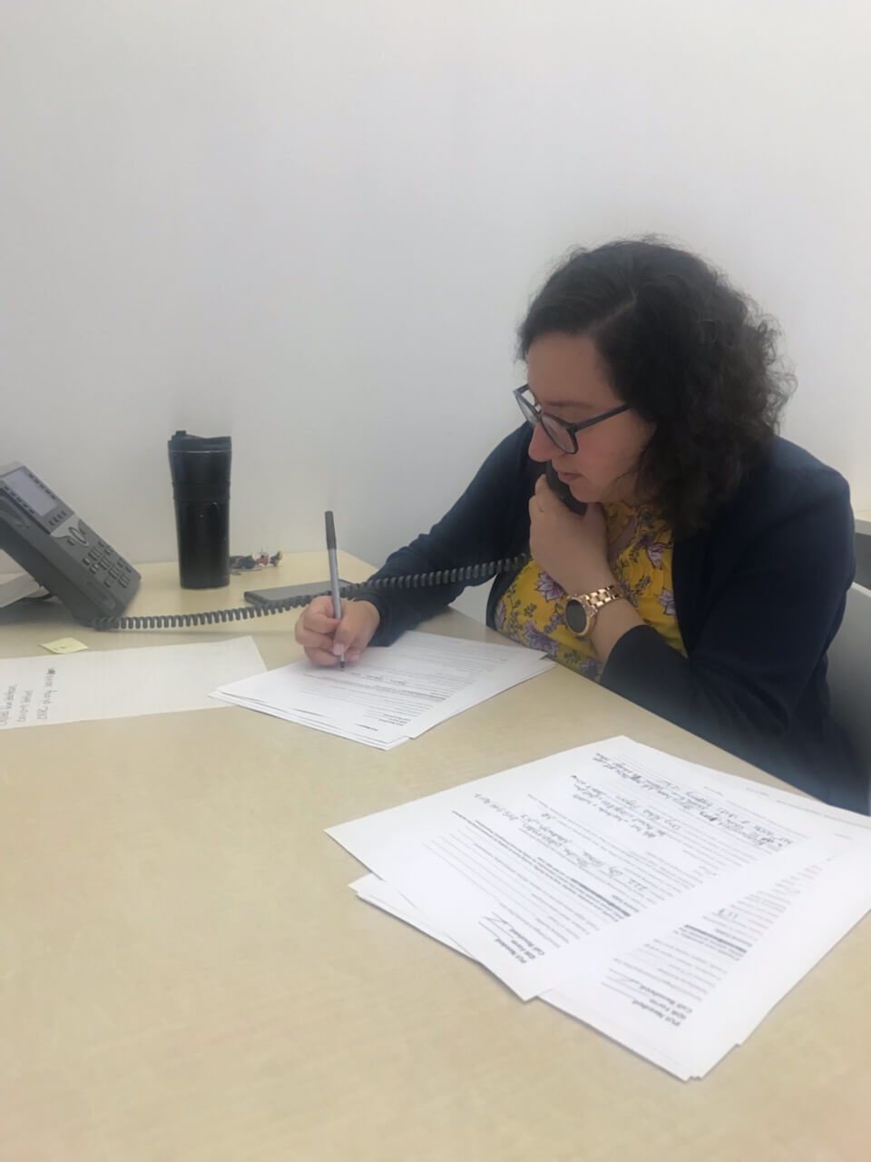 TouroCOM Middletown students volunteered to answer phones for the Orange County Department of Health during the current coronavirus epidemic. Above, OMS II Jermeen El-Zabet answers a call about the virus.