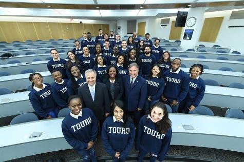 Underrepresented minority medical students of the TouroCOM Harlem Class of 2022 with their Deans: second row center, left to right: Dr. David Forstein, Dean; Dr. Nadege Dady, Dean of Student Affairs; and Dr. Arthur Prancan, Preclinical Dean