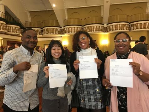 TouroCOM Harlem students holding up their letters of acceptance on "Match Day".