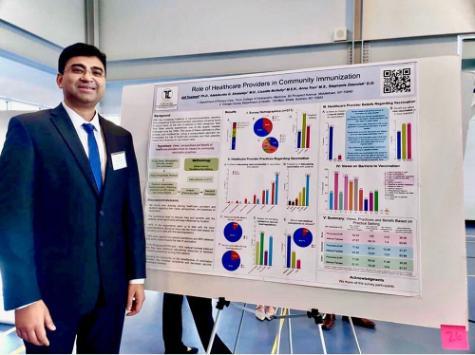 Atif Towheed presenting his research poster at the Annual Council of Osteopathic Student Government Presidents (COSGP) Winter Research Symposium